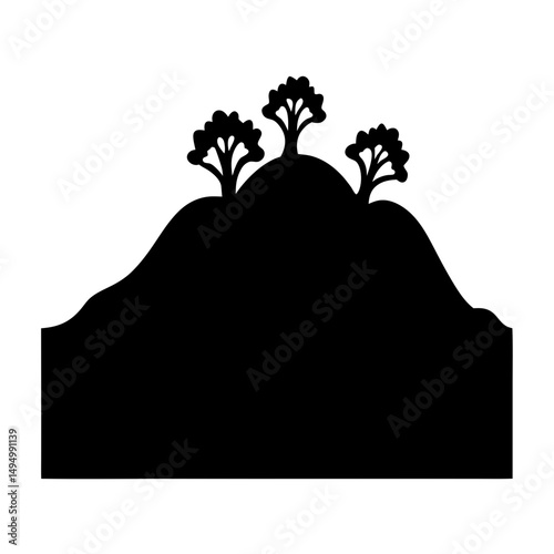 Black silhouette image of a hill with three trees on top
