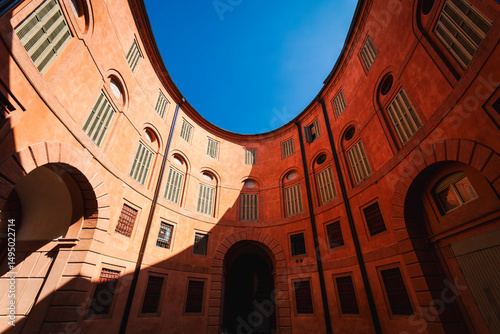 The City Theatre of Ferrara includes an elliptical structure once used for the carriages, today a monumental litle square dedicated to its designer, Foschini. photo