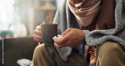 Konstfotografi Hands, tissue and person with tea in living room, sick or health issue with influenza, hayfever or sinusitis