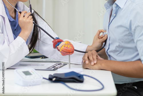 A man felt an abnormality in his left chest so he went to see a cardiologist and a chest doctor. A man went to see a heart doctor after experiencing pain in his left chest to check , copy space