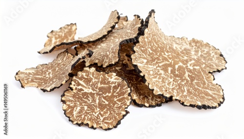 Fresh truffle shavings on white background with full depth of field for gourmet cuisine or luxury food concept
