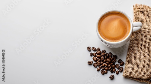 Espresso in white cup, coffee beans