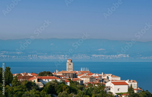 Fototapeta Naklejka Na Ścianę i Meble -  the town of Brsec in front of the Adriatic Sea with the city of Rijeka in Croatia in the background