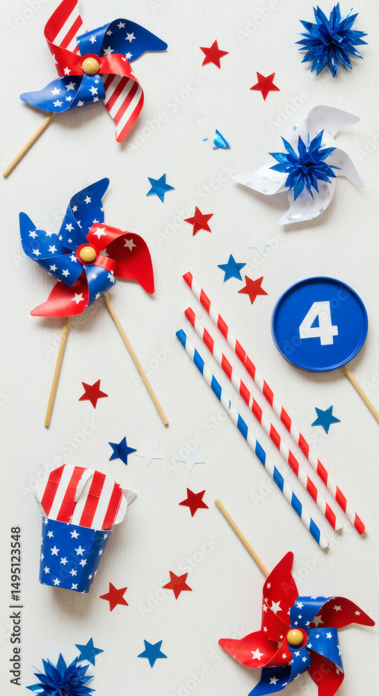 Obraz premium Flat Lay of Red White and Blue Party Decor with Pinwheels and Stripes for July 4th