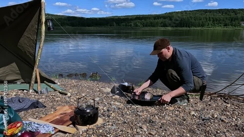 Cooking food over a fire outdoors