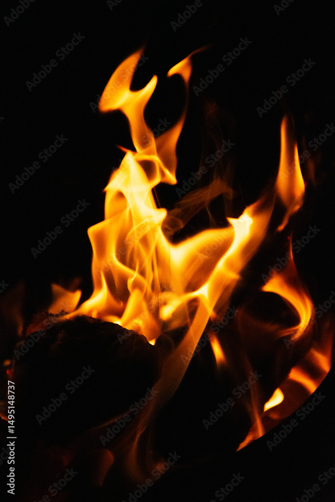 Fototapeta premium Fire flames on black background. Blaze flames background.