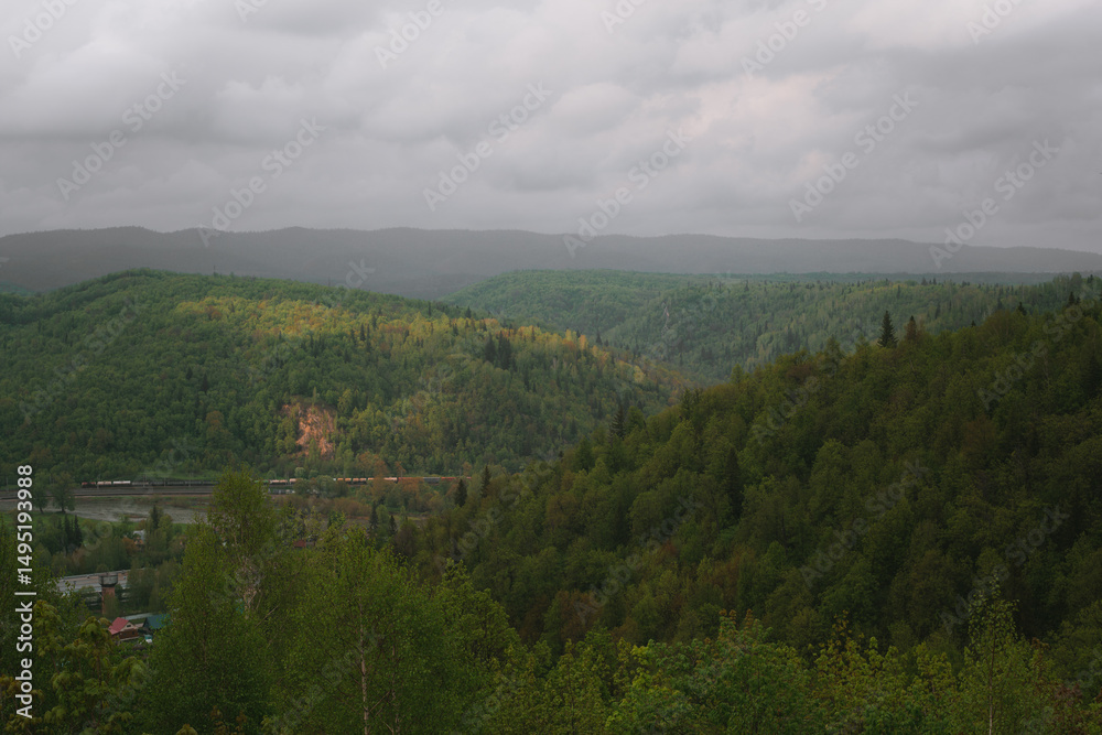 Obraz premium Mountain landscape, after the rain, warm spring weather, a walk in the forest. 