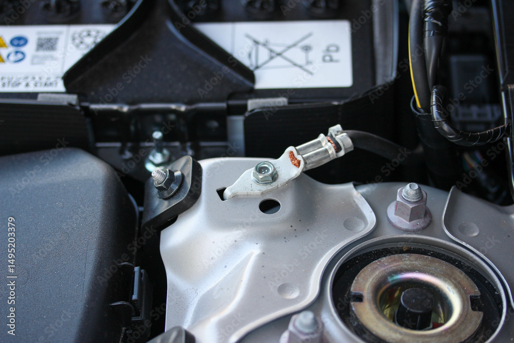Ground wire connection in the engine bay of a new car Ground wire connection in the engine bay of a new car
