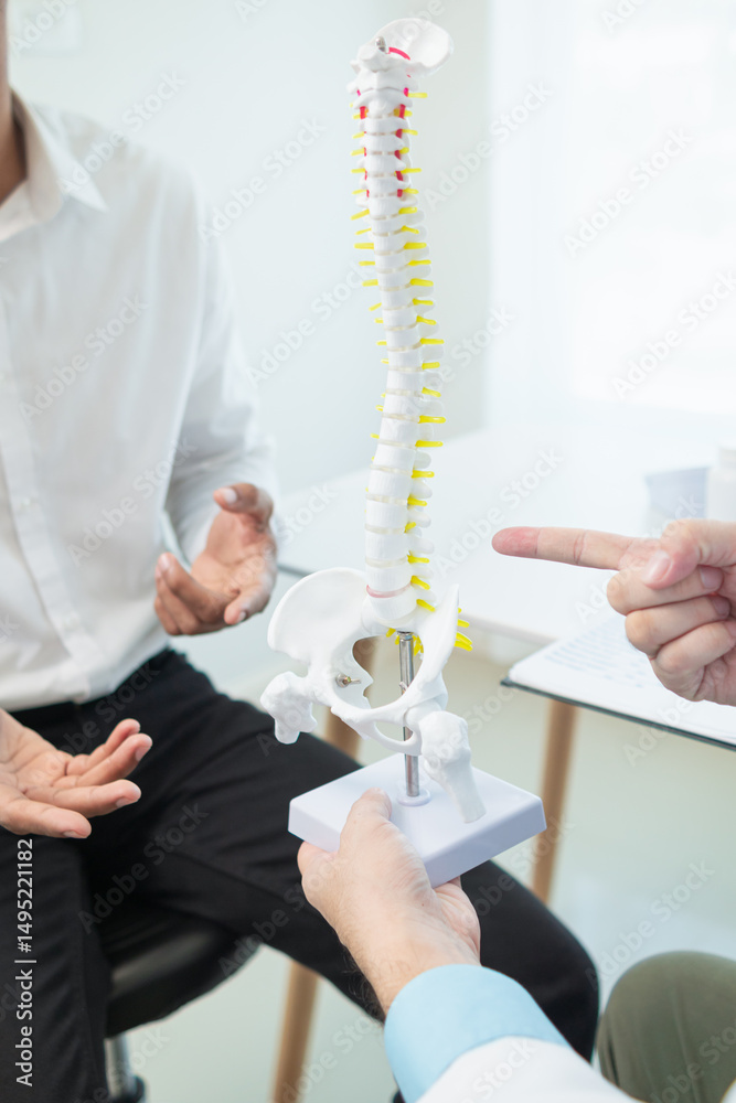Fototapeta premium patient experienced pain in the spine and sought advice from a doctor so that the doctor could diagnose and treat the back pain because the back pain made it impossible for him to live his normal life