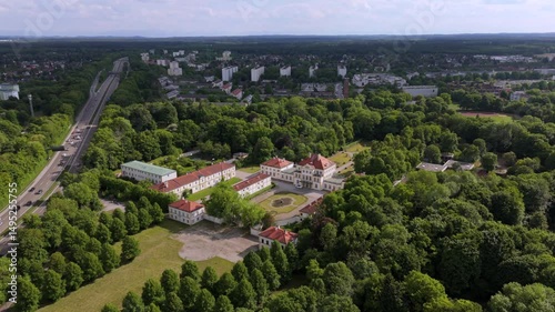 Drone footage of Fuerstenried Castle in southern Munich. Historic Baroque hunting lodge with symmetrical gardens and pastoral surroundings, ideal for cultural and travel themes. Schloss Furstenried.  photo