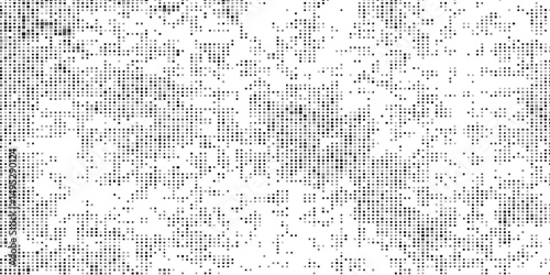 Halftone faded gradient texture. Grunge halftone grit background. White and black sand noise wallpaper.