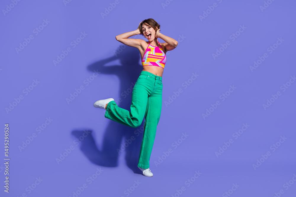 Obraz premium Photo of cheerful good mood pretty shiny woman wear bright clothes have fun summer friday weekend isolated on purple color background