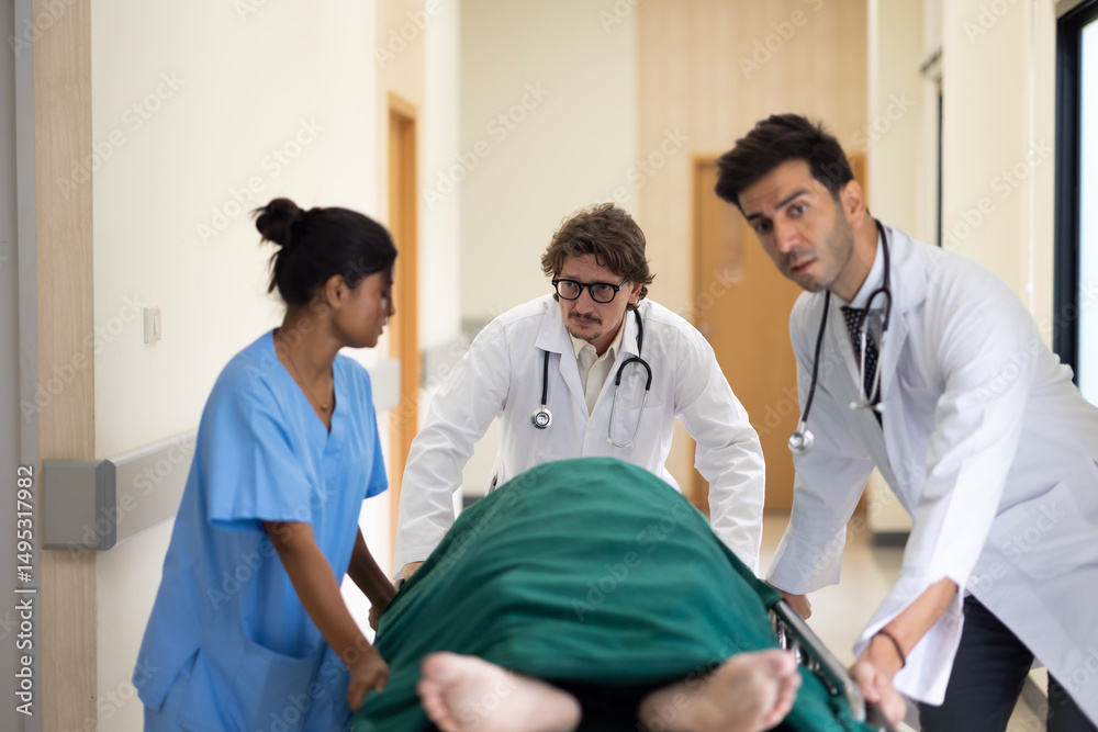 Obraz premium emergency hospital, Group of diverse man and woman medics or doctors Push Stretcher with Seriously Patient to Operating Room, Emergency Department