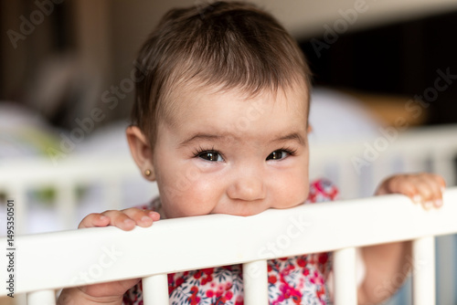 Fototapet Pain from the eruption of the baby's first tooth
