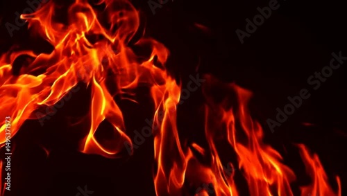 Fiery Whispers in the Darkness: A Mesmerizing Dance of Luminous Flames