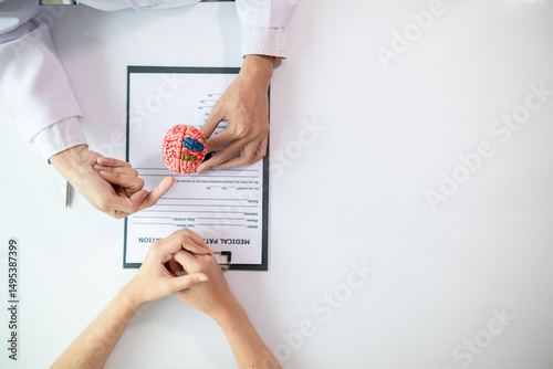 Tablou pe pânză doctor is asking about patient information and symptoms to diagnose brain diseases before consulting patient and diagnosing correct treatment