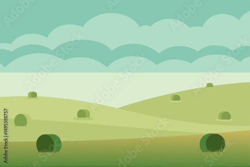 foggy field with hay bales scattered across 
