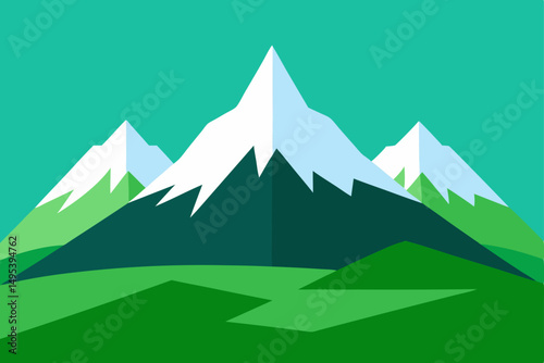 snow capped peaks above a green alpine valley 