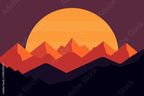 sunrise behind a silhouette of mountain ridges 