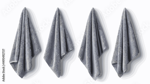 Set of Luxury Gray Towels Hanging Elegantly Against a Neutral Background for Home Decor