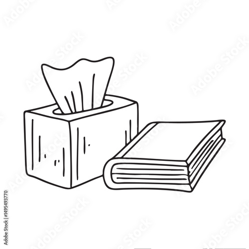 A tissue box near a book