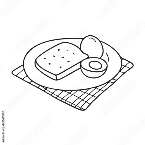 A toast beside boiled egg in plate