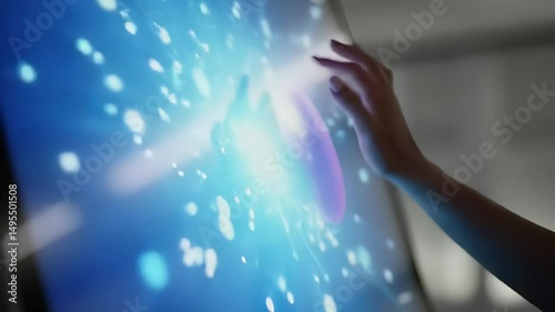 Hand Interacting with Futuristic Touchscreen Interface Displaying Digital Globe Technology                                