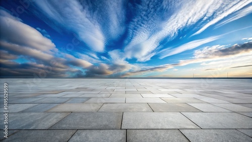 Vast Open Plaza Under a Dramatic Sky with Wispy Clouds and a Serene Horizon