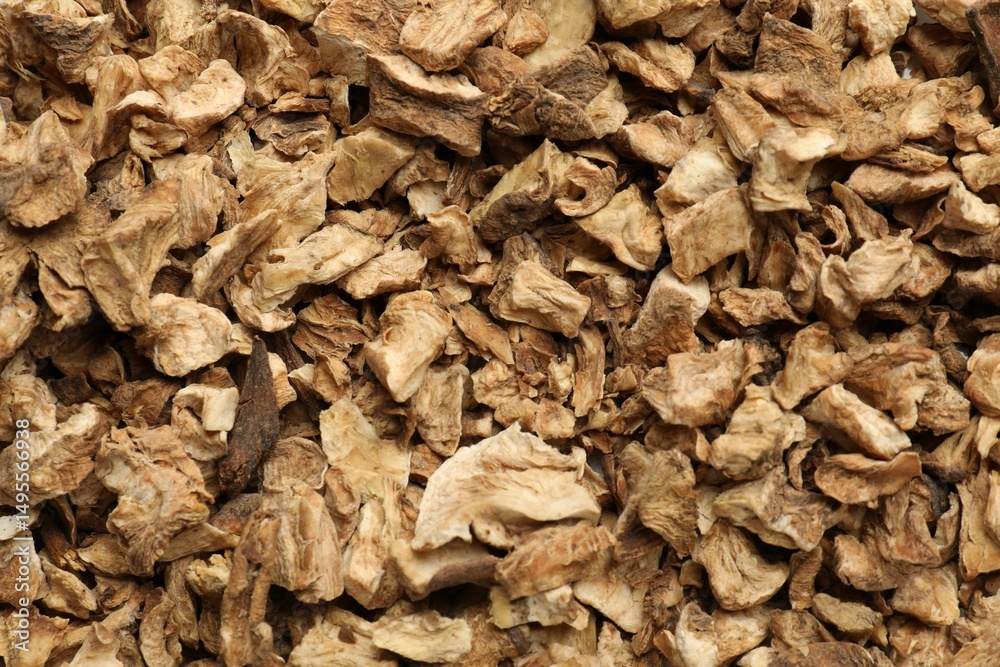 Pieces of dry chicory roots as background, closeup Pieces of dry chicory roots as background, closeup