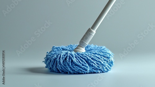 Light blue microfiber mop head on white handle