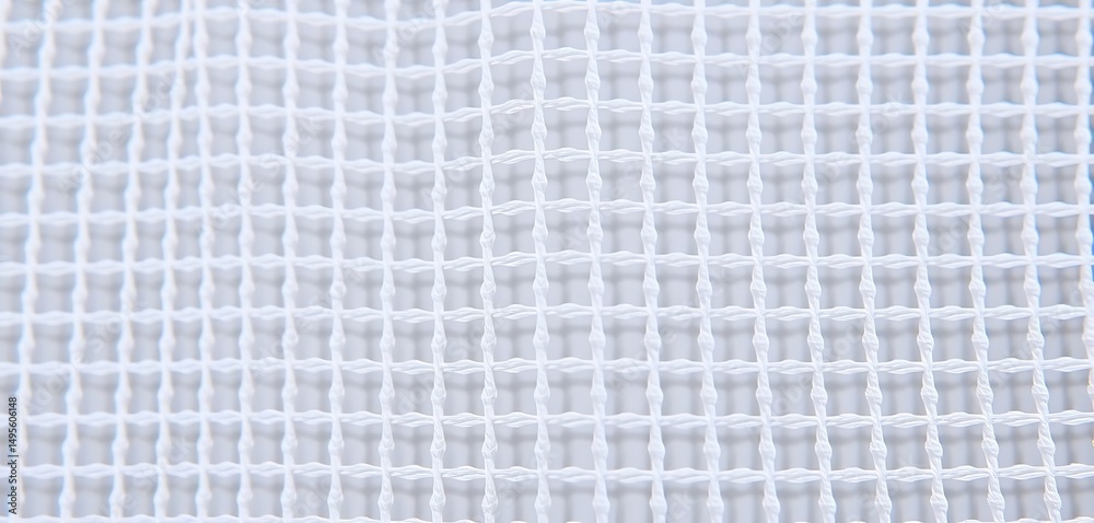Close-up of ripstop nylon fabric texture with grid-like square reinforcement, durable and lightweight material ideal for outdoor gear. Close-up of ripstop nylon fabric texture with grid-like square reinforcement, durable and lightweight material ideal for outdoor gear.