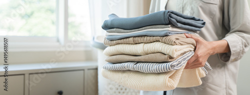 Canvas Print Housewife folding laundry clothes prepare before put in closet
