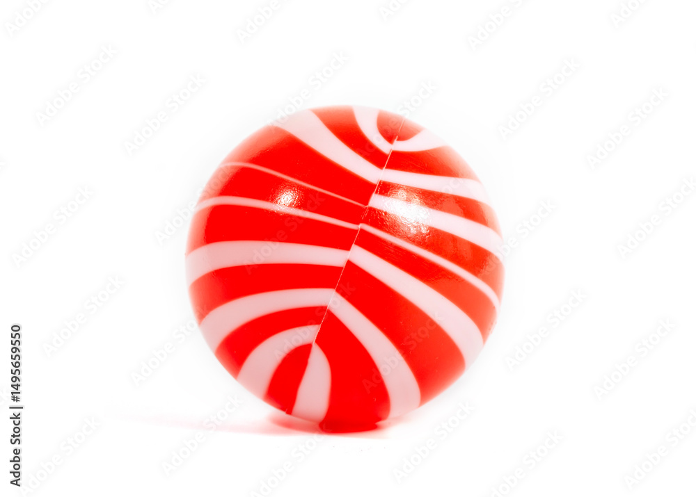 Red and white striped plastic ball, children's toy, isolated on white background Red and white striped plastic ball, children's toy, isolated on white background