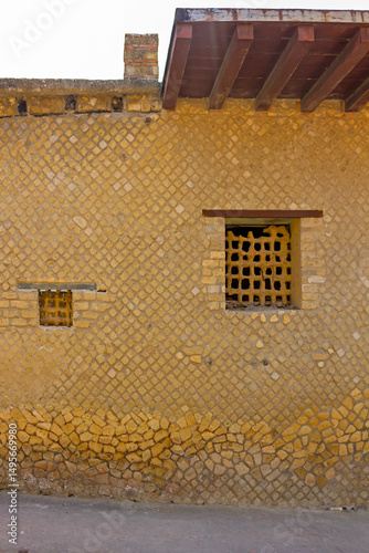 Old ruined windows outside on ancient building