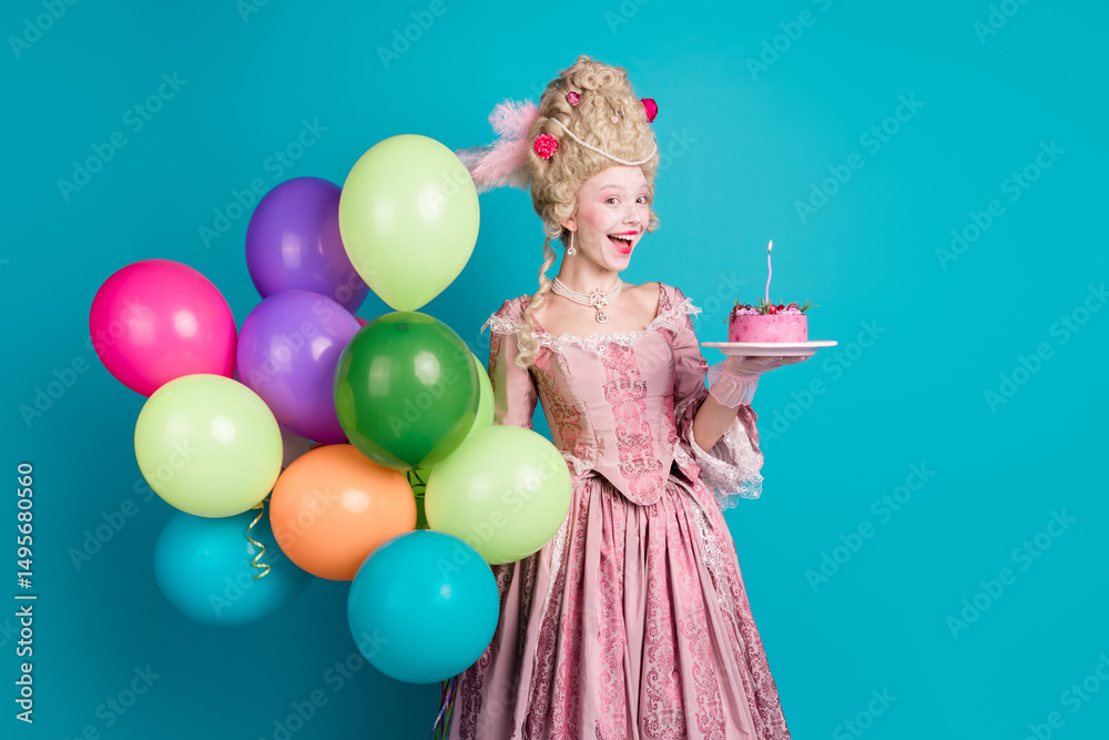 Fototapeta premium Photo of charming cheerful lady dressed renaissance garment celebrate birthday isolated on blue color background