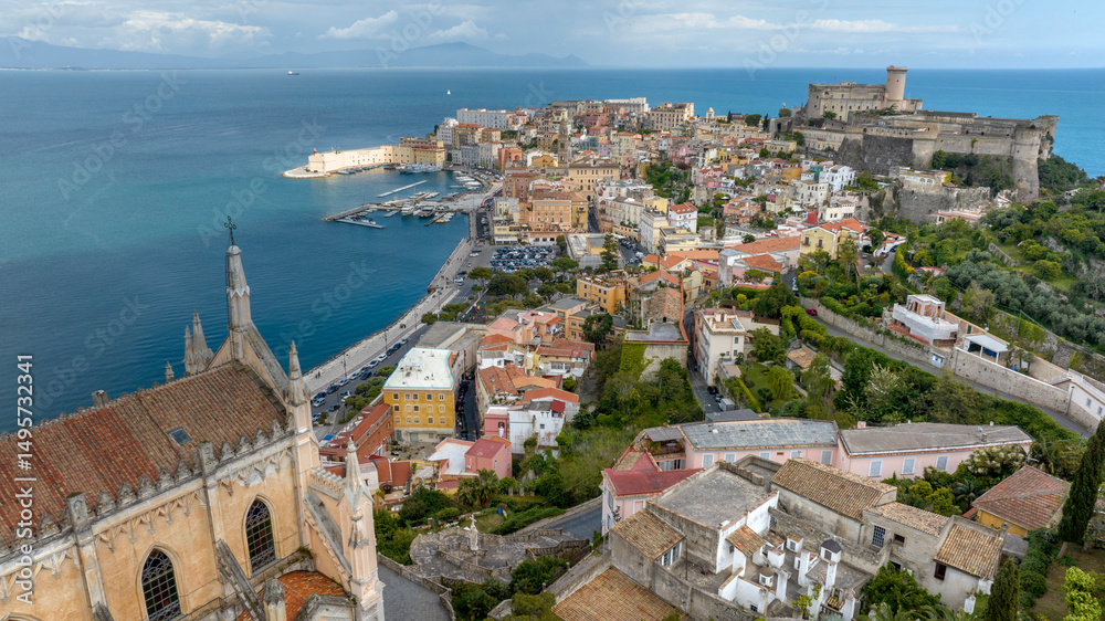 Obraz premium Skyline of the historic center of the town of Gaeta, overlooking the Mediterranean Sea. It's a tourist destination in province of Latina, Lazio, Italy. In foreground there is the temple of St. Francis