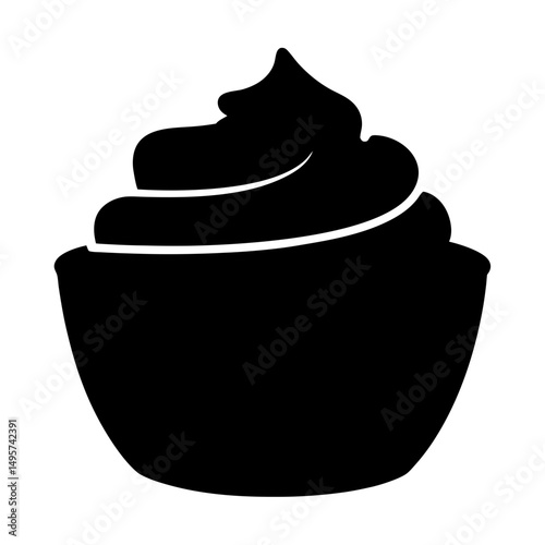 Silhouette of a delicious cupcake with creamy frosting and sweet filling
