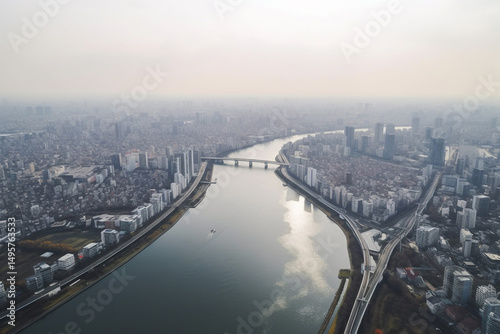 Hazy Horizons City Skyline and River from Above