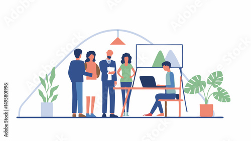 Group of people standing and sitting around a table with a laptop and a presentation board in an office space