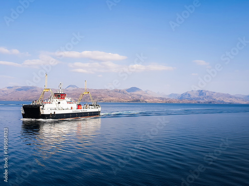 Fotografia Sound of Sleat, Isle of Skye, Scotland 10th May 2025, Two Caledonian MacBrayne car ferries pass each other near the terminal at Armadale on the Isle of Skye