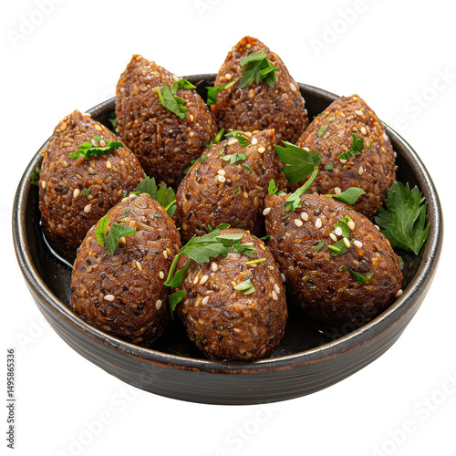 A bowl of traditional kibbeh garnished with herbs, ready to serve at a festive gathering