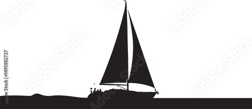 Silhouette of a sailboat sailing on the ocean