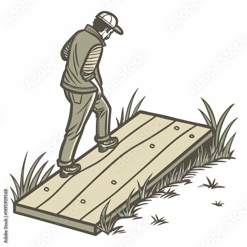 Man walking on a wooden boardwalk in the grass