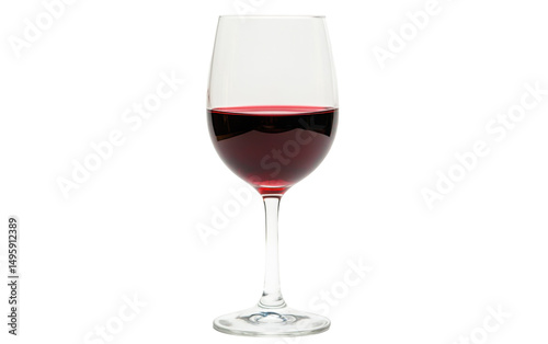 Glass of red wine is sitting on a table