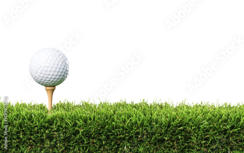 Golf ball is on a tee in a grassy field