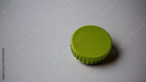 Green bottle cap mockup on a minimalist background for creative designs or branding.