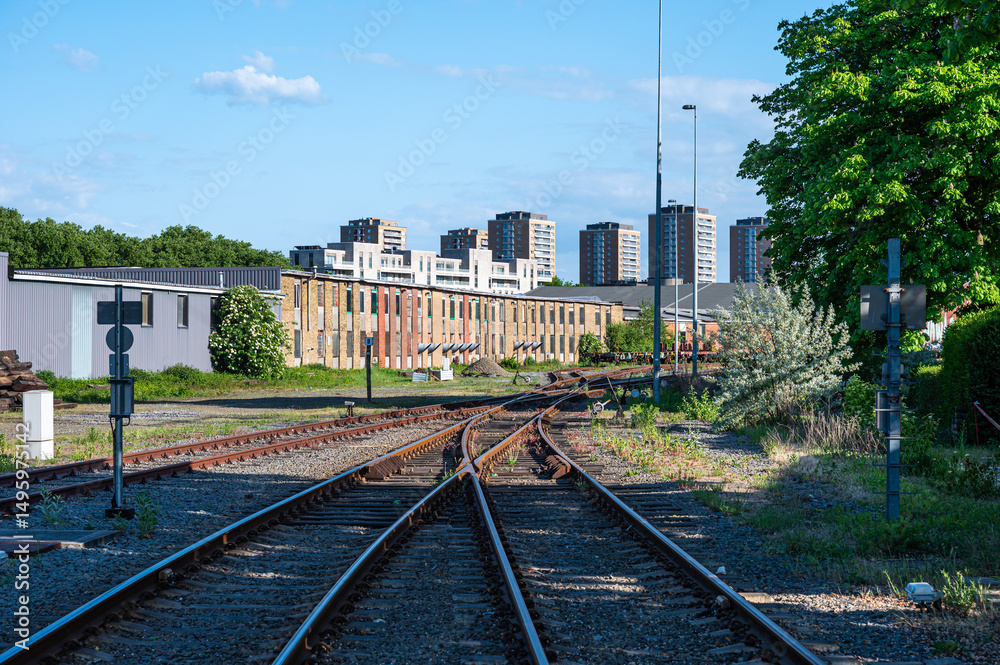 Fototapeta premium Railway trakcs and interchange at the industrial zone of the harbor of Antwerp city, Belgium