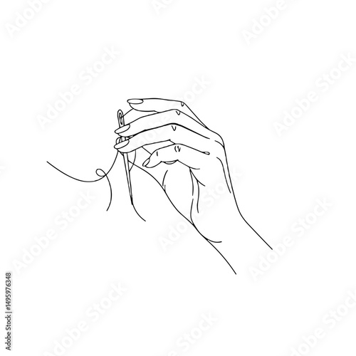 Hand threading a needle with copy space