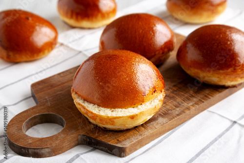 Homemade Brioche Buns Ready to Eat, side view.