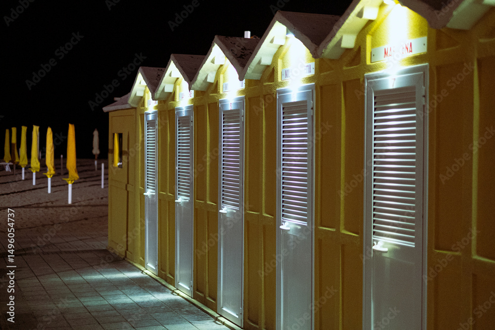 Fototapeta premium Yellow cabins on the sea beach